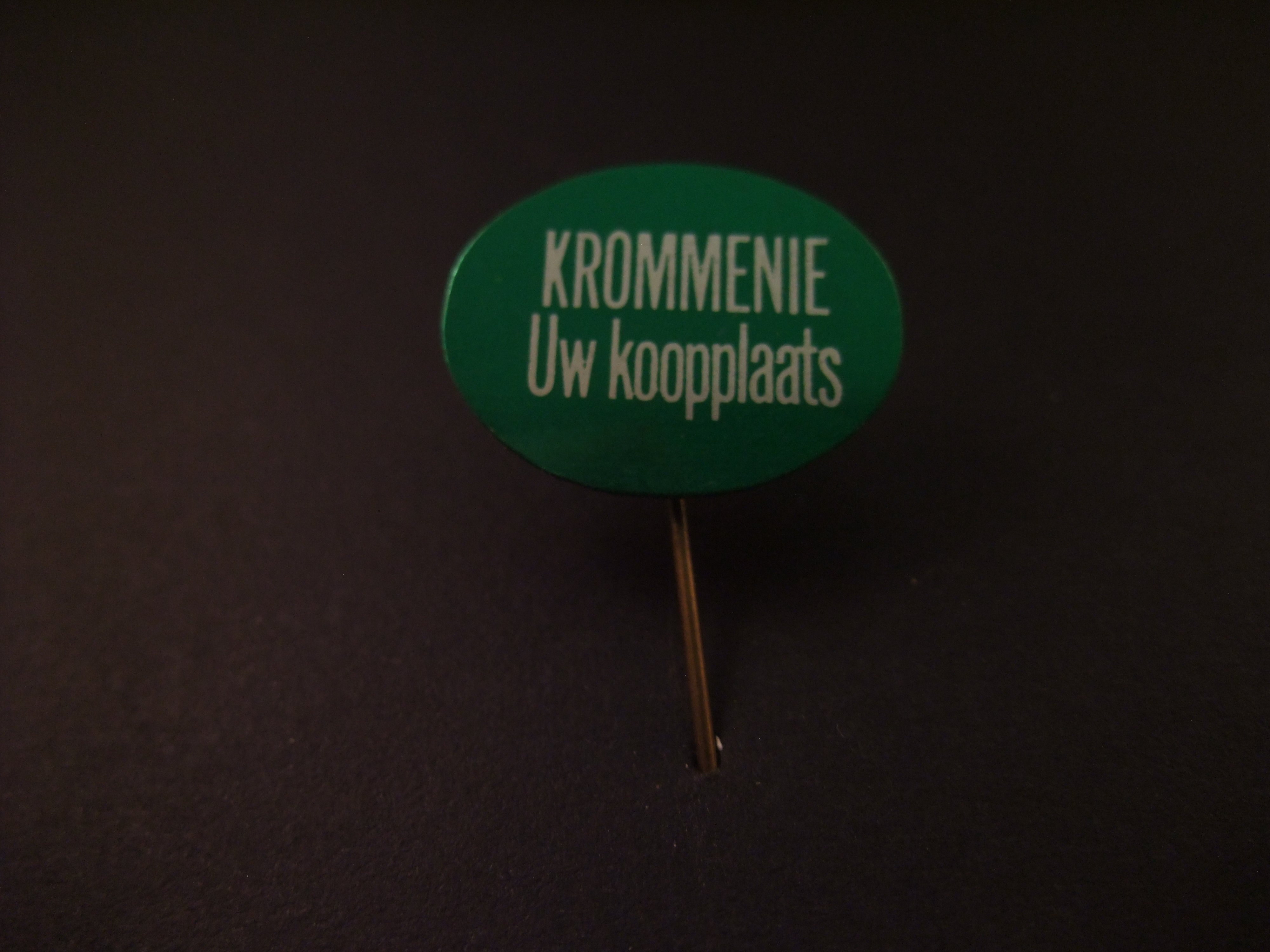 Krommenie( gemeente Zaanstad) Uw koopplaats( slogan Middenstand) groen